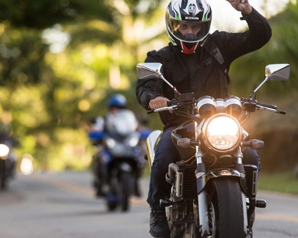 Rio das Flores (Rio de Janeiro), Brazil - April 11, 2015: Group of motorcyclists on the road RJ-143 coming to the XV Motorcycle Rio das Flores event. The festival is the largest motorcycle meeting in the southern of the Rio de Janeiro State.